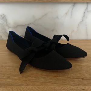 Rothy’s black point mary Jane with bow. Size 7 like new.